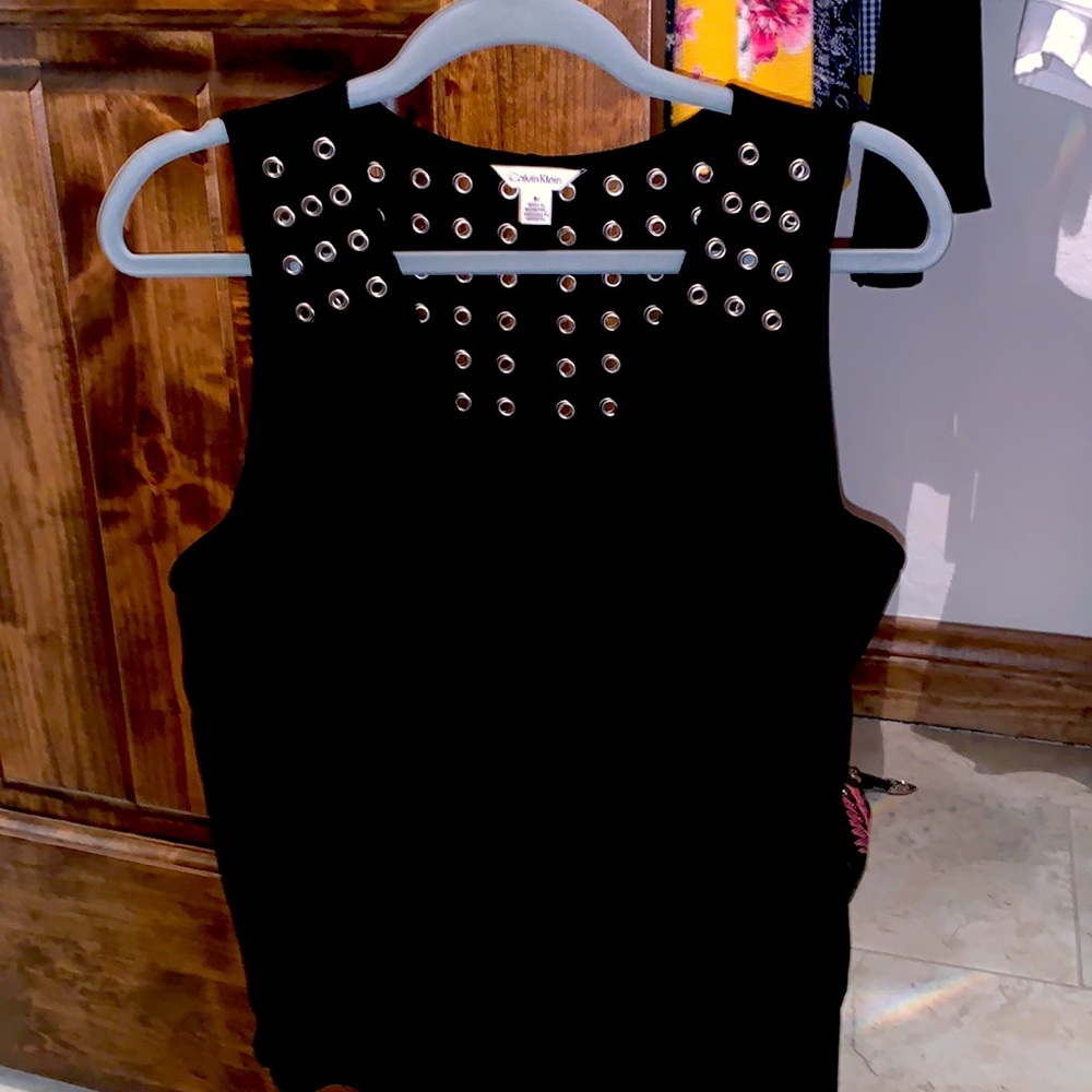 Sleeveless metal detail cut outs